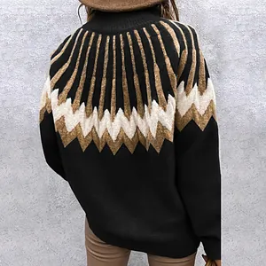 Back view of a women's high-neck knit sweater with black and brown geometric patterns