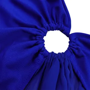 Close-up of vibrant blue jumpsuit fabric showing a ruched circular cut-out detail and texture