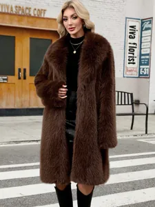 Close-up of a women's long brown faux fox fur coat in an urban street setting