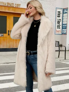 Stylish blonde woman in a cream-colored long faux fur coat for elegant winter street style.