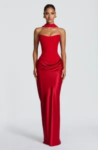 Elegant red strapless satin evening gown with draped floor-length skirt and matching neck scarf