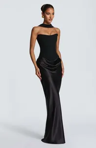 Elegant black strapless corset dress with a draped satin maxi skirt and choker accessory