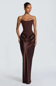 Elegant chocolate brown strapless corset evening gown with draped satin maxi skirt details