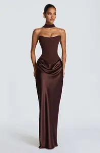 Elegant brown strapless corset gown with draped satin skirt and matching neckband.