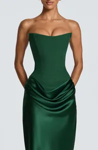 Elegant emerald green strapless corset gown featuring draped luxury satin fabric