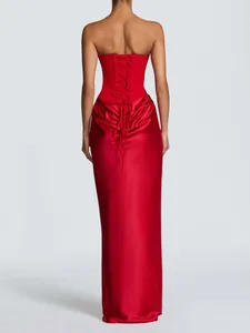 Elegant red satin strapless evening gown featuring a detailed lace-up corset back