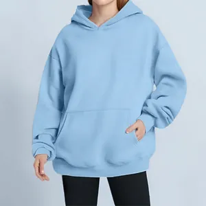 Comfortable oversized light blue hoodie featuring a front kangaroo pocket and drawstring hood