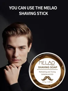 Detail shot of sandalwood shaving soap presented by a male model for grooming skincare
