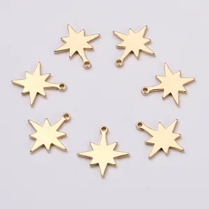 Detail view of 7 gold eight-pointed star charms for DIY jewelry making and crafts
