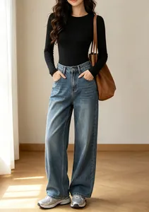 Elegant slim fit long sleeve black bodysuit styled with wide-leg jeans for casual wear