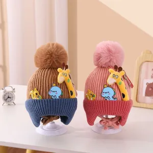 Cozy baby knitted winter hats with fluffy pom-poms and cute 3D cartoon animal patches