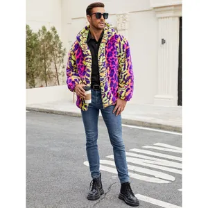 Man in colorful leopard print faux fur jacket standing on a city street background