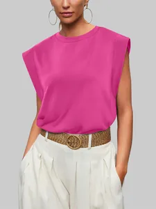 Stylish fuchsia sleeveless muscle tee featuring padded shoulders and a relaxed fit