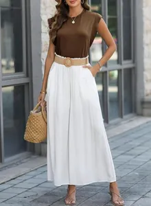 Summer brown cap sleeve sleeveless t-shirt and white wide leg pants set lifestyle detail view.