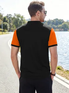 Vista posteriore di una polo da uomo a maniche corte con color-blocking nero e arancione