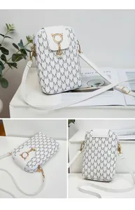 Detailed views of a white crossbody phone bag featuring M-pattern and pearl tassel decor.