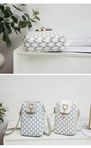 Two elegant printed mobile phone bags with cat-ear charms and pearl tassel accents