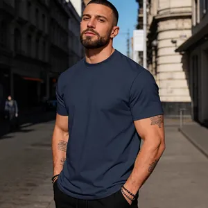 Men's casual navy blue pure cotton crew neck t-shirt shown in outdoor street style