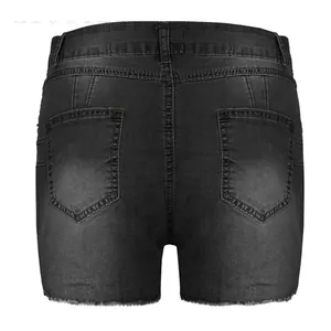 Back view of women's black stretch denim shorts with raw hem and functional pockets.