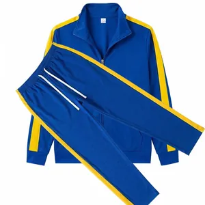 Detailed view showing the vibrant yellow side stripes on blue men's casual tracksuit set