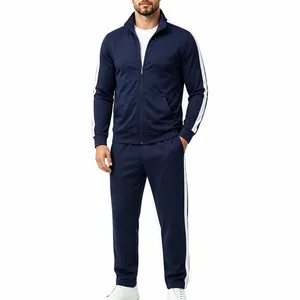 Detailed view of navy blue men's tracksuit with white side stripes and stand collar.