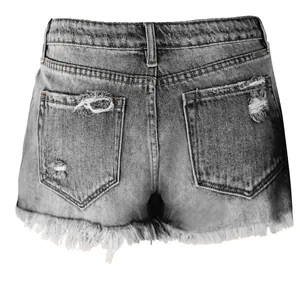 Close-up of women's grey high-waisted ripped denim shorts showing back fringe hem