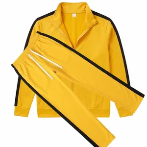 Men's yellow two-piece tracksuit with black side stripes and a stand-up collar detail