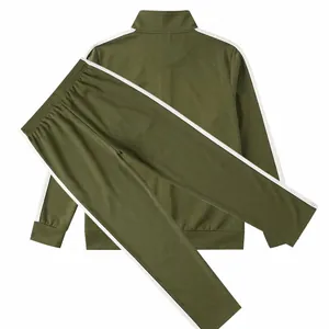 Detail view of men's olive green tracksuit with side white stripes and stand collar