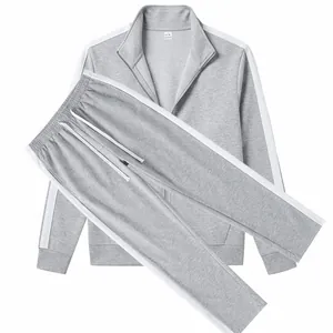 Premium gray men's tracksuit set with white side stripes, stand collar jacket and pants.