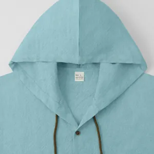 Light blue men's cotton linen hooded shirt with textured fabric and drawstring detail