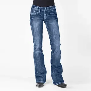 Front full-length view showing the slimming flare fit and washed texture of these denim jeans