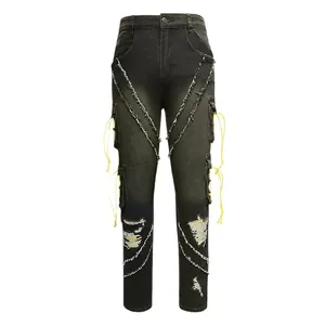 Streetwear distressed black slim cargo jeans for men with ripped details and yellow drawstrings