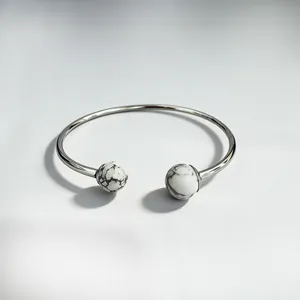 Sleek stainless steel open cuff bracelet with polished marbled white stone beads