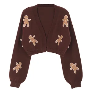 Kort bruin gebreid damesvest met schattig peperkoekmannetje-borduurwerk voor de herfst
