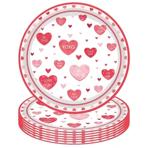 Detailed view of pink heart Valentine's Day themed disposable paper plates set
