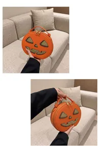 Creative Halloween pumpkin handbag with glitter jack-o-lantern face and gold dual zippers