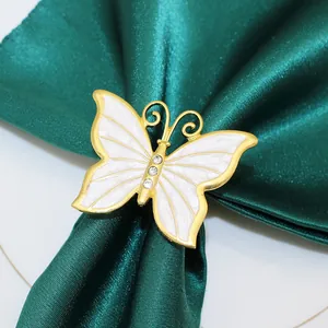 Elegante portatovagliolo a farfalla dorato con smalto bianco per decorazione tavola da pranzo