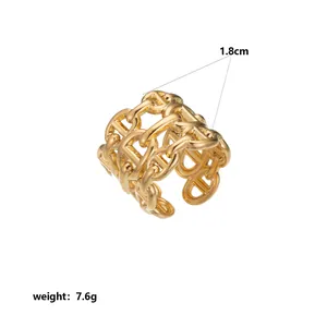 Detailed macro view of wide gold stainless steel geometric chain link ring, 1.8cm width