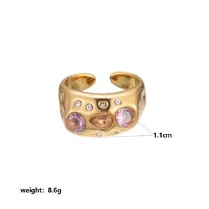Detail view of chunky gold stainless steel ring with dimensions and 8.6g weight info