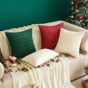 Macro view showing textured wheat spike corduroy pillow covers in festive living room
