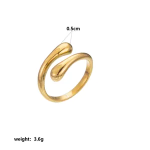 Detail view of gold stainless steel petal ring with 3.6g weight and 0.5cm width specifications
