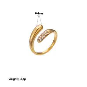Detailed view of gold-plated stainless steel open ring with pave crystal accents and 3.2g weight