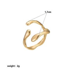 Detailed view of irregular wavy gold ring showing 1.7cm diameter and 2g weight specs