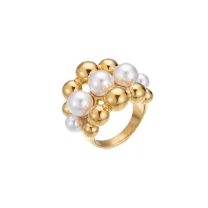 Statement stainless steel ring with clustered gold beads and white pearls
