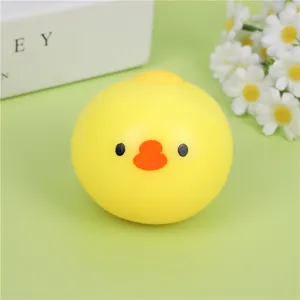 Close-up of a cute yellow round chick squeeze toy for stress relief and sensory play