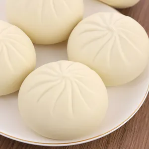 Close-up detail showing the realistic texture of white steamed bun stress relief squeeze toys
