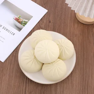 Close-up of slow rebound decompression bun toy set with realistic texture on plate
