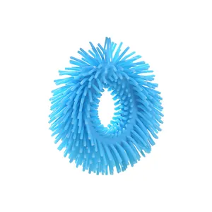Detailed close-up shot of a blue soft rubber puffer bracelet with tactile spikes