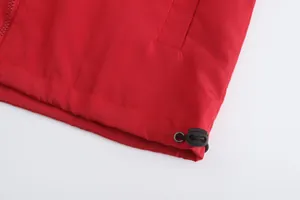 Detail of red men's thin jacket hem with adjustable drawstring toggle