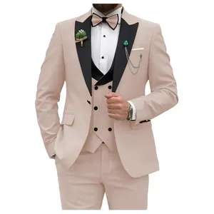 Modern slim fit three-piece men's suit in light pink with black lapels for weddings